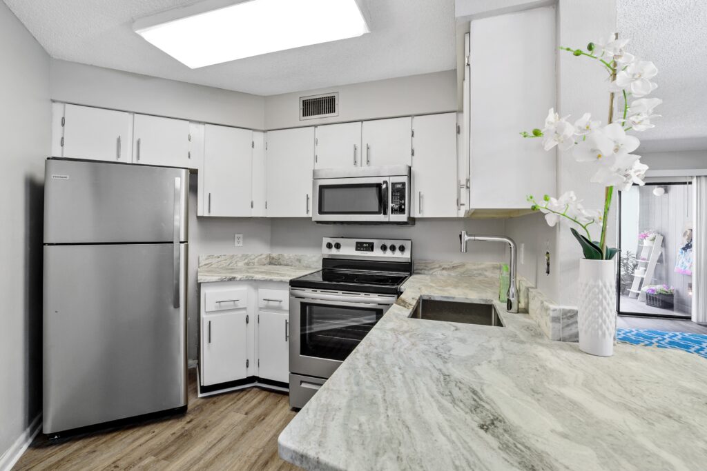 White and gray kitchen in condo
