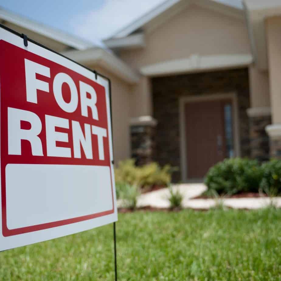 rental property with for rent sign 