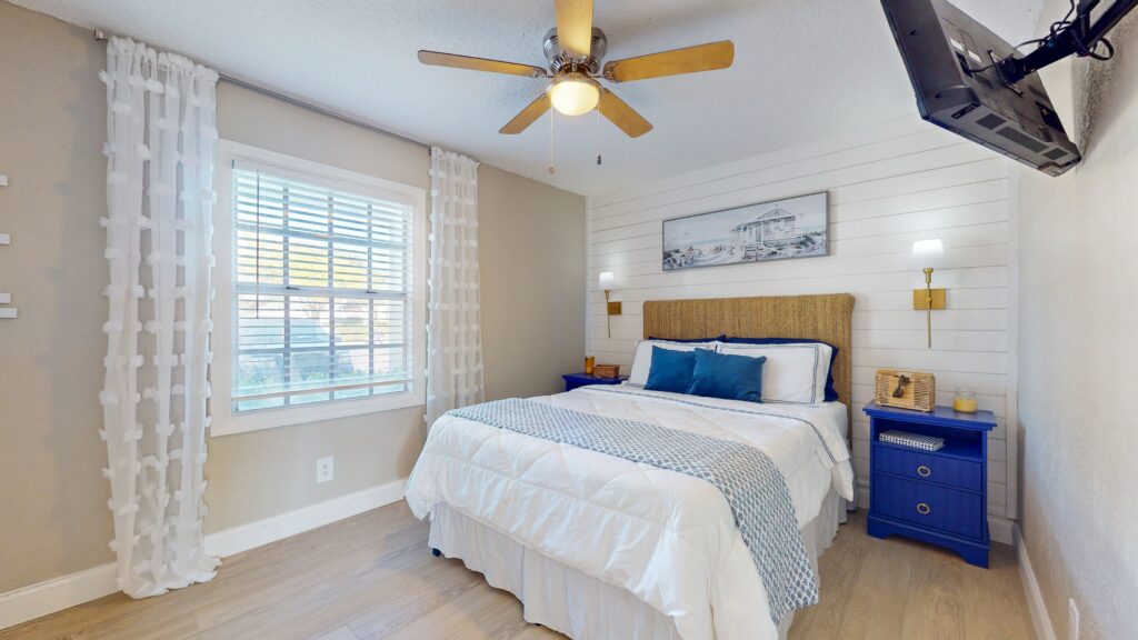 master bedroom in airbnb st petersburg fl with coastal decor