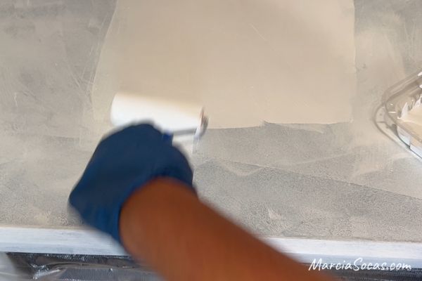 second coat of white primer on countertop