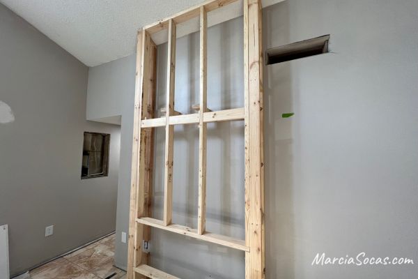 frame for diy shiplap fireplace wall
