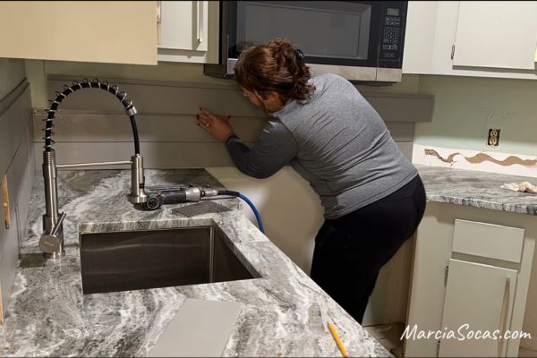 adding shiplap backsplash behind range