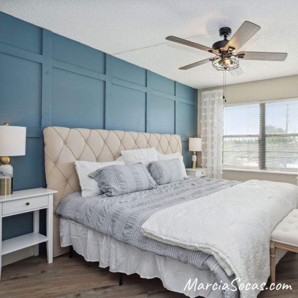 Blue DIY Board and Batten accent wall in a renovated room