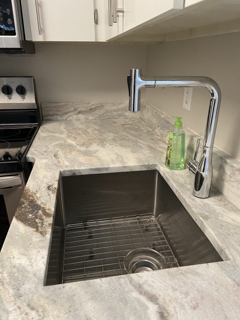 New sink and faucet in condo flip