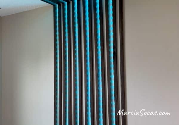 wood slat wall with lights