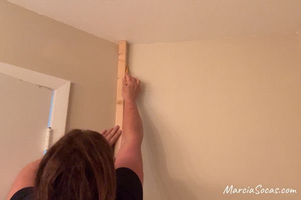 creating guide line for installing luxury vinyl plank on wall
