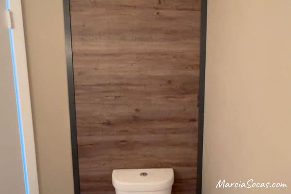 vinyl plank wall with trim pieces on both sides