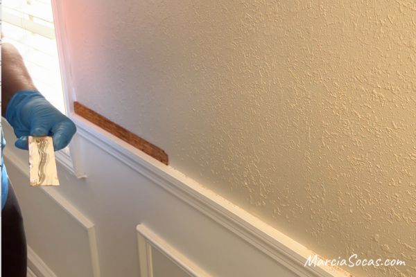 adding wood shims to wall