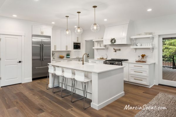 white kitchen with island and white countertops