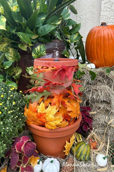 fall porch decor using a fountain