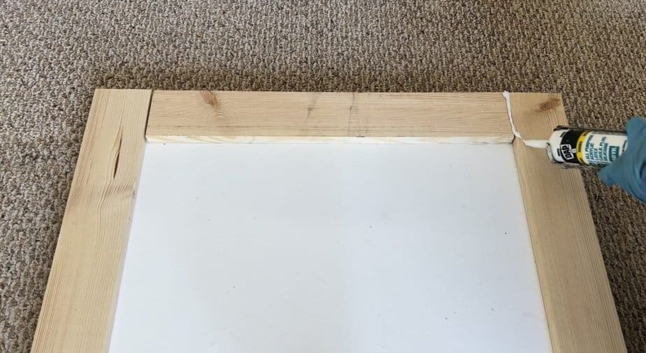 Finishing diy barn door with caulking